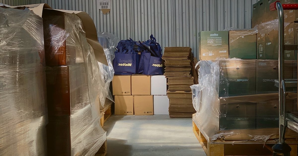2026'da E-Ticaret Sektöründeki Yenilikler: Dijital Ticareti Dönüştüren Trendler - Eco-friendly packaging materials stacked neatly in a warehouse