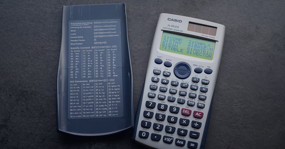 Bebek & Çocuk Ürünleri 2026: Kâr Marjı ve Fiyatlandırma Stratejileri - close-up of calculator with financial charts and baby clothes