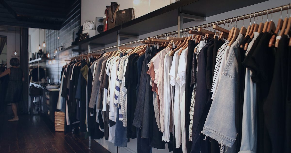 Bebek & Çocuk Ürünleri 2026: Kâr Marjı ve Fiyatlandırma Stratejileri - curated selection of artisanal baby clothing on wooden hangers