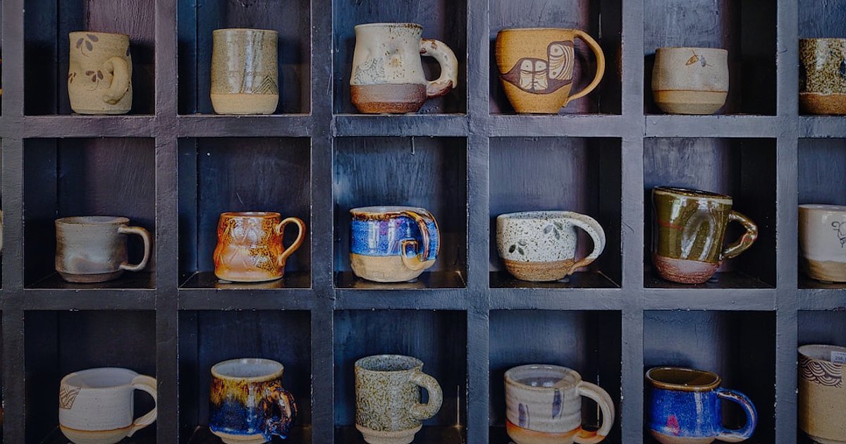 Dropshipping From Turkey: 2026'da Küresel Pazarda Başarıya Ulaşın! - hands selecting artisan ceramic mugs and textiles from shelves
