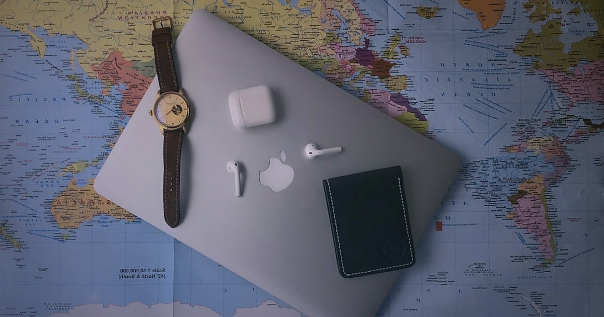 Dropshipping Rehberi 2026: Stoksuz Satışla Kârınızı Katlayın! - magnifying glass over a world map with product icons