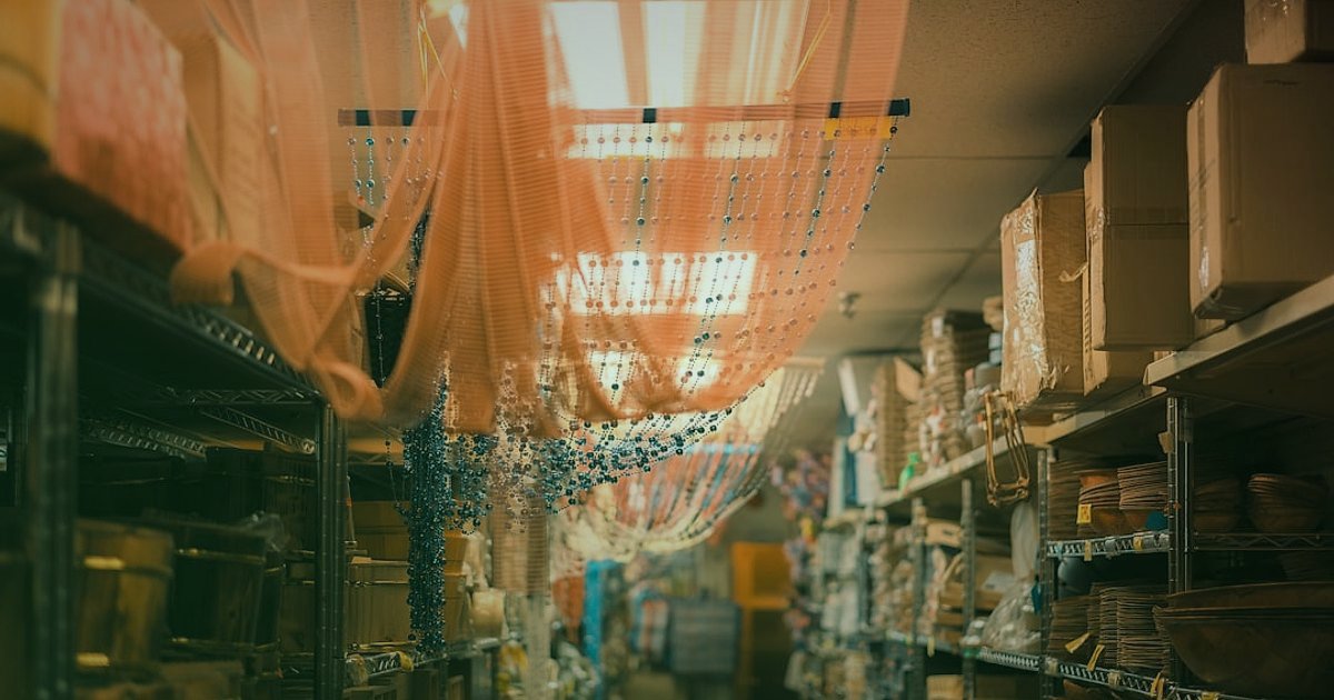 ETBİS Kaydı Nedir? E-Ticaret İçin Zorunlu Mu? 2026 Güncel Bilgi - warehouse shelves filled with diverse product boxes