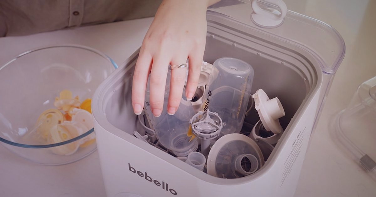 Hamile Bakım Kargo Sırları: Paketleme, Desi ve Teslimat 2026 - close-up of hands carefully placing glass baby bottle into protective foam insert