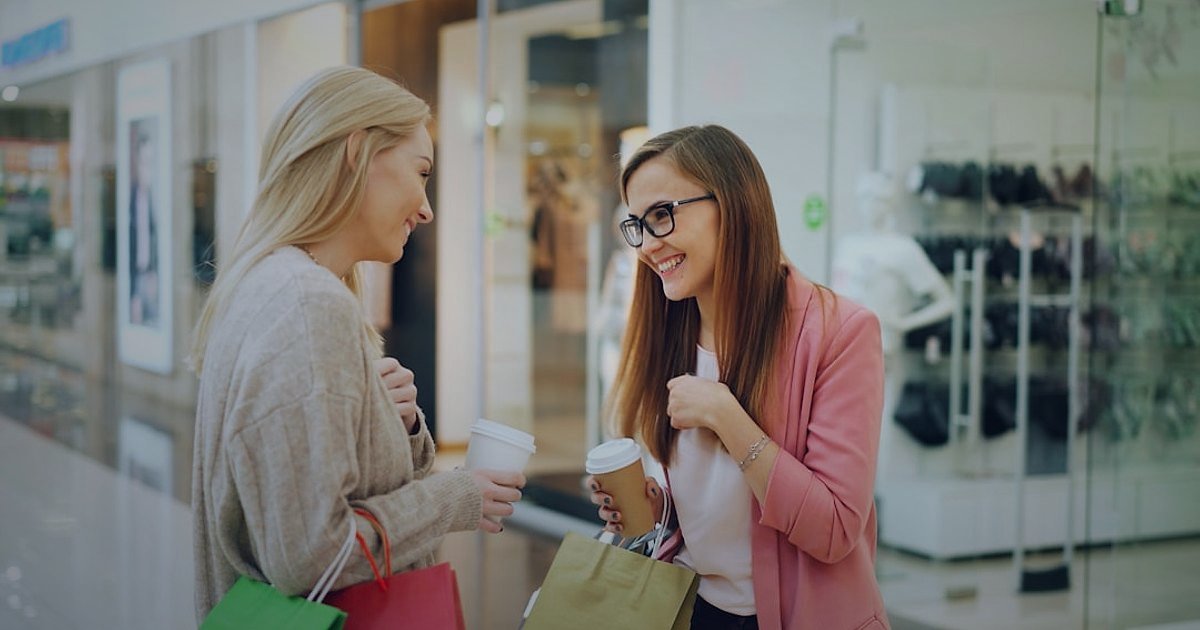 Hepsiburada'da Satıcı Olma 2026: Adım Adım Başlangıç Rehberi - person comparing price tags on different products in a retail environment