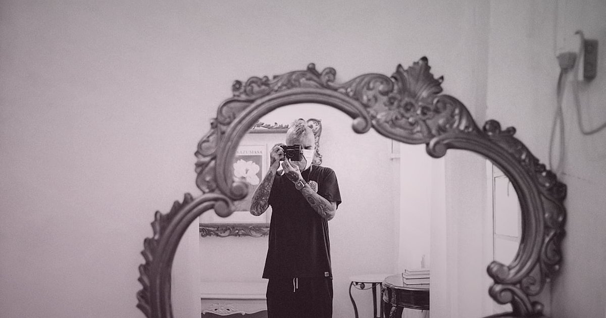 Tesettür Abiye Alıcısının Sırları: 2026'da Kimler Neden Satın Alıyor? - woman trying on ornate evening gown mirror